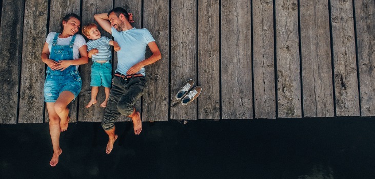 Loving family on a lake trip take picture with Stealth Drone 4K